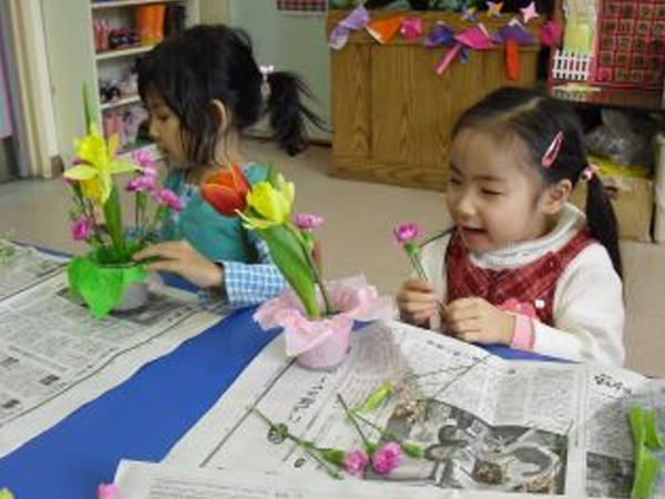 「どこに生けようかな。」